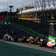 A photo of Kevin Magnussen leading the field in Brazil.